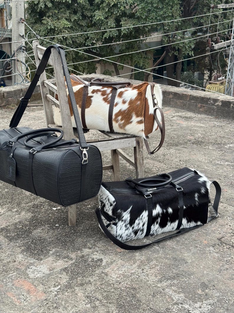Leather Carry On bag shown as a professional Messenger Bag style.
