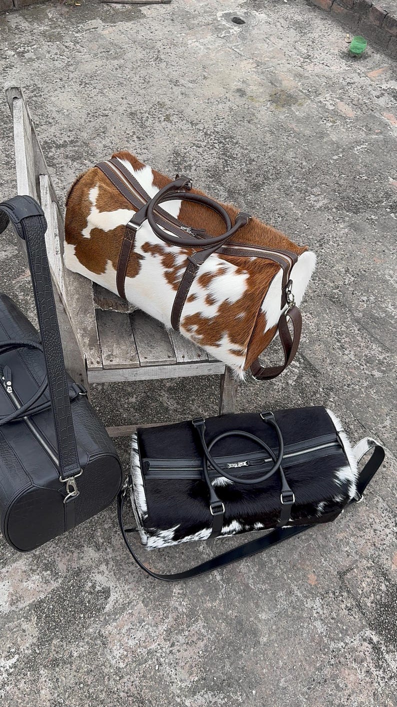 Large Leather Duffle Bag used as a premium Gym Bag and Camera Bag.