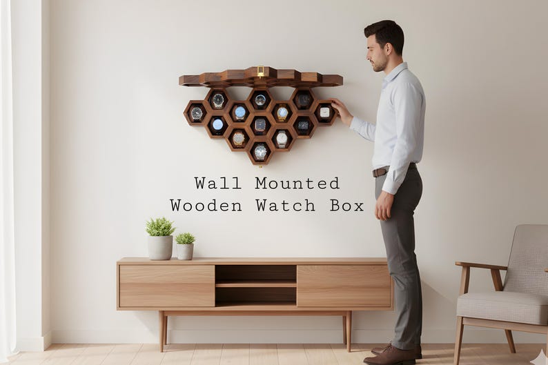 May include: A wall-mounted wooden watch box with a honeycomb design, holding multiple watches. The box is made of dark wood and is mounted on a white wall. The text "Wall Mounted Wooden Watch Box" is displayed below the watch box.