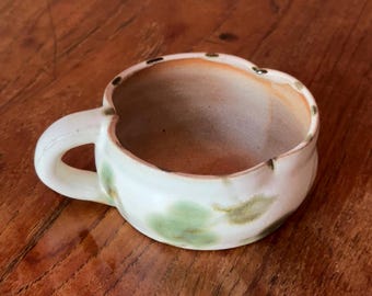 Taza de cerámica floral