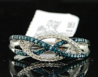 ブルートパーズ インフィニティノットリング - シルバーツイストエタニティバンド - 繊細で輝くブルージェムストーンリング - 女性のための象徴的なプロミスリング