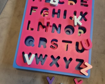 Puzzle di forme dell'alfabeto