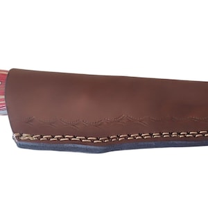 16. Hunting knife with carbon steel blade, laminated wood handle and custom leather sheath