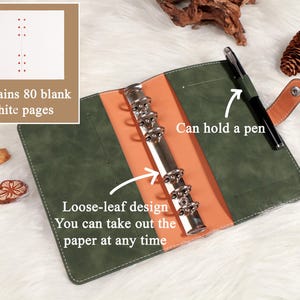 May include: Green and orange loose-leaf binder with a silver ring mechanism. The binder includes 80 blank white pages and a pen holder. The text on the image says, "Loose-leaf design. You can take out the paper at any time."