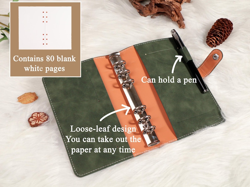 May include: Green and orange loose-leaf binder with a silver ring mechanism. The binder includes 80 blank white pages and a pen holder. The text on the image says, "Loose-leaf design. You can take out the paper at any time."