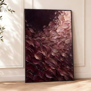 May include: A rectangular wall art piece in a black frame featuring an abstract oil painting with thick, textured brushstrokes. The composition displays a gradient of deep burgundy and dark plum tones transitioning into lighter shades of dusty rose.