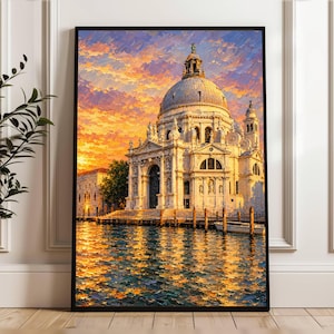 May include: A framed wall art print depicting the Santa Maria della Salute church in Venice at sunset. The painting features thick, textured brushstrokes in shades of orange, yellow, and blue, capturing the dome and facade reflected in the water.