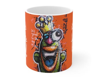 Ceramic mug designed by Kaza | orange background
