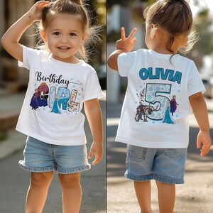 May include: A white t-shirt with the text "Birthday GIRL" and a graphic of characters from a popular animated movie. The back of the shirt has the name "OLIVIA" and the number "5". The shirt is worn by a young child.