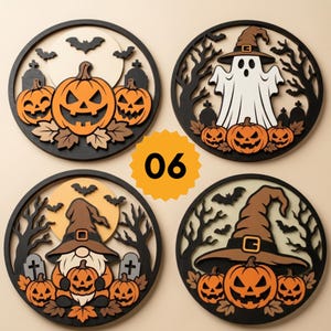 May include: Four circular wooden wall decorations featuring Halloween themes. Designs include jack-o'-lanterns, a ghost in a witch hat, a gnome in a witch hat, and a large witch hat. Each piece incorporates black silhouettes of trees, bats, and tombstones.