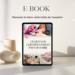 May include: A tablet displaying an e-book titled "CE QUE VOS CLIENTES N'OSENT PAS VOUS DIRE". The screen shows a manicure being performed, with pink gloves and nail polish. The words "E-BOOK" and "Recevez-le dans votre boîte de réception" are also visible in the image.