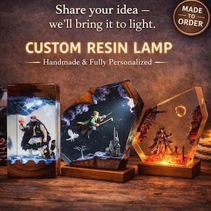 May include: Custom resin lamps with unique designs. The lamps are handmade and fully personalized. The image shows three lamps with different scenes inside, including a wizard flying on a broomstick and a figure with a staff. The lamps are made to order.