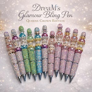 May include: A collection of bedazzled pens in various colors, including pink, green, and blue. Each pen is covered in sparkling rhinestones and topped with a decorative crown. The text "Dream's Glamour Bling Pen" is visible.