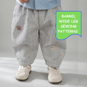 May include: Barrel wide leg pants featuring a vertical black and white pinstripe pattern, small embroidered animal motifs, and a light blue shirt tucked in. A green graphic overlay displays the text BARREL WIDE LEG SEWING PATTERNS.