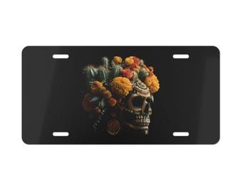 Piatto decorativo con teschio di Catrina azteca e cactus.