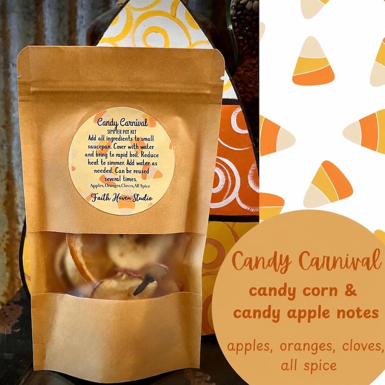 May include: A brown paper pouch containing a simmer pot kit labeled Candy Carnival. The label includes instructions to add ingredients to a saucepan with water and simmer. The kit contains dried apple slices, orange slices, and cloves.
