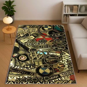 May include: A rectangular area rug featuring a collage of vintage car emblems in gold, silver, and black. The rug displays logos from various automotive brands, creating a textured, metallic appearance. The design includes logos from BMW, Volkswagen, and Triumph.