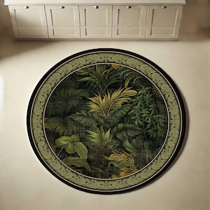 May include: A round rug featuring a lush jungle scene with various shades of green and yellow foliage. The rug has a black border and a decorative green and white patterned edge, creating a vibrant and natural aesthetic.