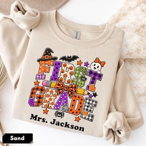 Personalized First Grade Teacher Halloween Sweatshirt | Custom Name 1st Grade Matching Crewneck, Faux Patchwork
