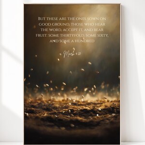 May include: A rectangular wall art print featuring dark, earthy soil with small seeds scattered across the surface. The text reads: But these are the ones sown on good ground, those who hear the word, accept it, and bear fruit: some thirtyfold, some sixty, and some a hundred. Mark 4:20.
