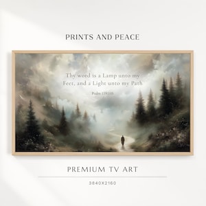 May include: A rectangular framed digital artwork featuring a misty mountain landscape with evergreen trees and a lone figure walking on a path. The text reads: Thy word is a Lamp unto my Feet, and a Light unto my Path. Psalm 119:105. PRINTS AND PEACE.