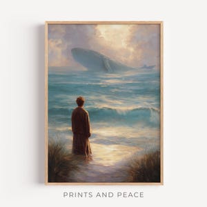 Könnte beinhalten: Ein gerahmter Kunstdruck zeigt eine Person, die im flachen Wasser steht und einen großen Wal im Ozean betrachtet. Das Kunstwerk zeigt eine ruhige Meereslandschaft mit bewölktem Himmel und dem Text "PRINTS AND PEACE" am unteren Rand.