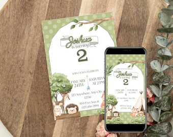 May include: A birthday invitation with a woodland theme. The invitation features the text "Joshua is turning 2" in a banner, with details for the party. A smartphone displays the same invitation. The background is a wooden surface.