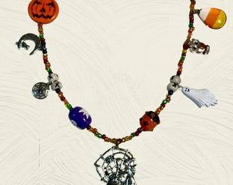 Stirring her Witchy Brew Pendent and Beaded Necklace with Halloween themed Charms