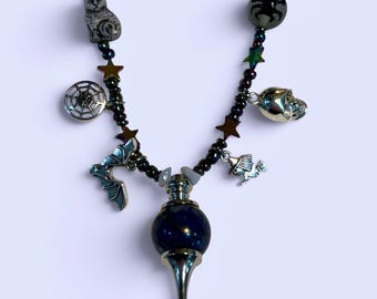 Blue themed Mystical, Magical Necklace with Halloween Charms and Foucalt's Pendulum center