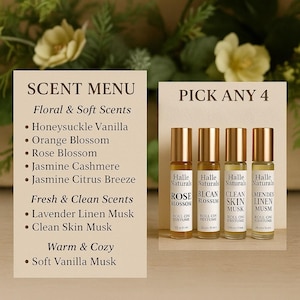 May include: An image of a scent menu and four roll-on perfume bottles. The scent menu lists floral, fresh, and warm scents. The perfume bottles are labeled Rose Blossom, Blcan Blossom, Clean Skin Musk, and Mendes Linen Musm.