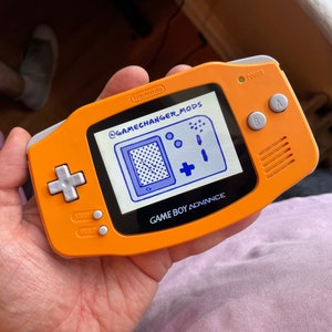 Custom IPS Modded Gameboy Advance backlight with new buttons, shell, glass screen lens. Free Game!