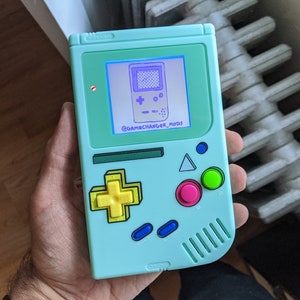 Custom backlit Adventure Time BMO Gameboy DMG, modded bivert Nintendo game boy with new buttons, shell, and free game!