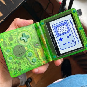 Custom GBASP IPS Modded Gameboy Advance SP - backlit screen with new battery, buttons, shell, glass screen lens, battery, free game!