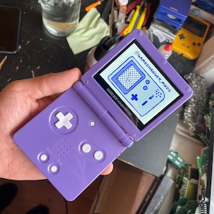 Custom GBASP IPS Modded Gameboy Advance SP - backlit screen with new battery, buttons, shell, glass screen lens, battery, free game!