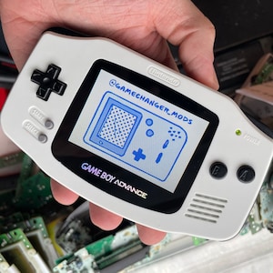 Custom IPS V3 Modded Gameboy Advance backlight with new buttons, shell, glass screen lens. Free Game!