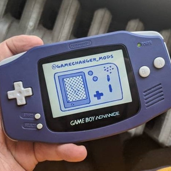 Custom Modded Gameboy Advance IPS backlight with new buttons, shell, glass screen lens. Free Game!