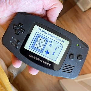 Custom Modded Gameboy Advance IPS backlight with new buttons, shell, glass screen lens. Free Game!