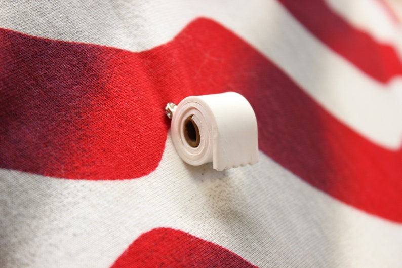 2. "Miniature Toilet Paper Roll Nail Art" - wide 6
