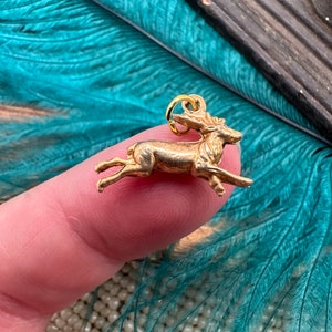 Vintage Raw Brass TINY PUFFY REINDEER Charm Pendant Gold Stamping