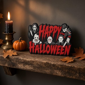 May include: A black rectangular sign with the red text "HAPPY HALLOWEEN" featuring illustrated horror movie characters including a ghost-faced figure, a clown, a hockey-masked figure, a man with a knife, and a clawed figure in a fedora hat.