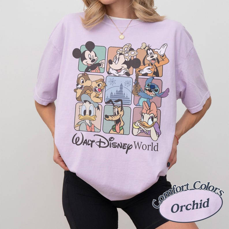 May include: Orchid-colored t-shirt featuring a grid of Disney characters including Mickey Mouse, Minnie Mouse, Goofy, Chip and Dale, Donald Duck, Pluto, Stitch, and Daisy Duck. The words "Walt Disney World" are printed below the grid.