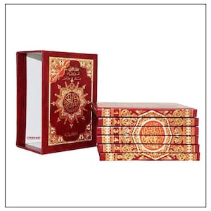 May include: A set of six red and gold religious books with Arabic script and ornate designs. The books are in a matching red box with gold accents. The box is open, revealing the white pages inside. The books are stacked neatly.