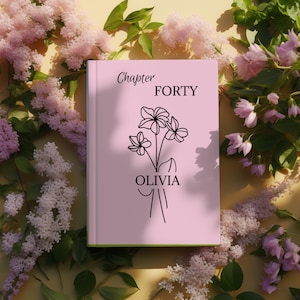 Może przedstawiać: Różowa książka z napisem "Chapter FORTY OLIVIA" i kwiatową ilustracją. Książka otoczona jest różowymi i białymi kwiatami na żółtym tle.