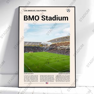 May include: Poster print of BMO Stadium in Los Angeles, California. The image shows a soccer field with players, surrounded by stadium seating. Text includes "BMO Stadium" and "22,000 spectators."