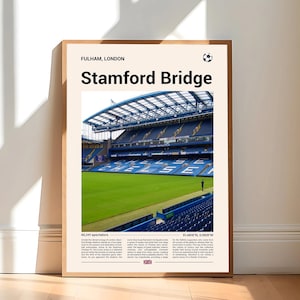 May include: A framed poster featuring a photograph of Stamford Bridge stadium in London. The image shows the green field and blue seating of the stadium. Text at the top reads "Fulham, London" and "Stamford Bridge". A soccer ball graphic is also present.