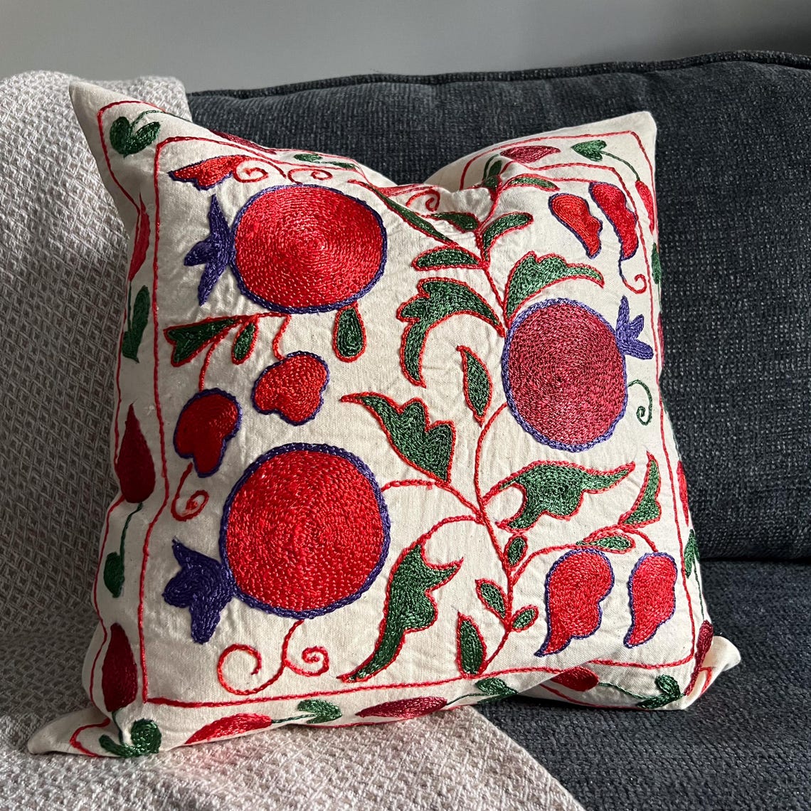 Hand-embroidered suzani pillow cover in silk thread on cotton