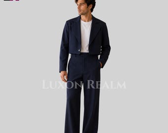 May include: A navy blue cropped blazer with a single button closure and matching high-waisted wide-leg trousers. The outfit is paired with a plain white crew neck t-shirt. The text Luxon Realm is visible in the center and LR is in the top left.