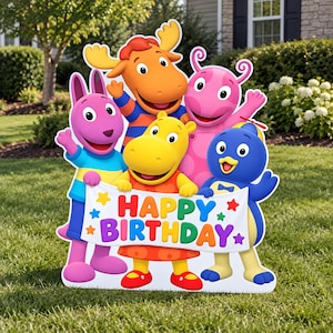 May include: A colorful yard sign featuring five cartoon characters from The Backyardigans standing together. The characters are holding a white banner with the text HAPPY BIRTHDAY in multi-colored letters, decorated with small stars in various colors.