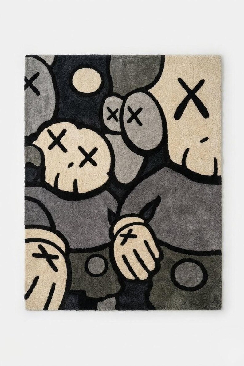 May include: A rectangular rug featuring a repeating pattern of abstract figures in shades of gray, black, and cream. The figures have X-shaped eyes and hands with X-shaped markings. The rug has a modern, cartoonish aesthetic.