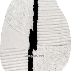 Hand-Tufted Abstract Wool Rug: loop-low and cut-high Design